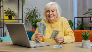 woman counting money - Retirement Passive Income